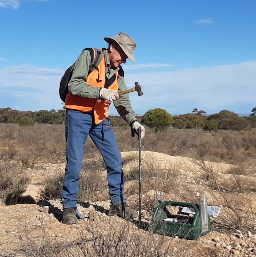 Glen driving in the last Wombat warren marker to finish his 20+ year study and documentation of 3,000+ wombat Warrens at Moorunde WR